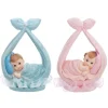 Baby i klæde figur dreng